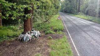 A floral tribute for Wilson Bang on the A3090.