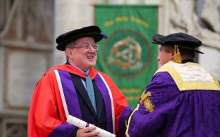 Andrew Lumsden receiving an honorary doctorate from University of Winchester in 2023