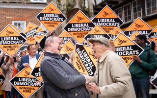Liberal Democrat leader Sir Ed Davey is greeted by supporters as he arrives to join local Lib Dem celebrations after the council elections on May 2