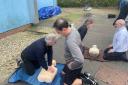 Players practise CPR
