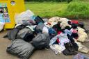 Photos of the items left outside the charity bins at Swanmore Village Hall