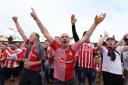 Saints fans outside St Mary's on Friday night before their play-off semi-final against West Bromwich Albion