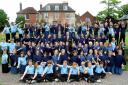 Twyford School pupils and headmaster Dr Steve Bailey celebrate the school's inspection results