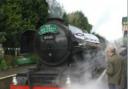Amid steam, the Flying Scotsman on the Watercress Line