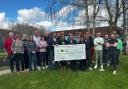 South Winchester Golf Club presenting the cheque to Hampshire and Isle of Wight Air Ambulance