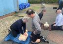 Players practise CPR