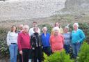 Directors of the Marston Gate Management Company and other residents in front of a rebuilt section of the wall. Image: Barry Shurlock