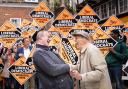 Liberal Democrat leader Sir Ed Davey is greeted by supporters as he arrives to join local Lib Dem celebrations after the council elections on May 2