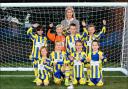 NEW DEAL: Romsey Town under-eights with Lady Brabourne and their new kit. Order no: 19727739