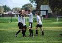 GET IN: Romsey Town celebrated a double victory last weekend.