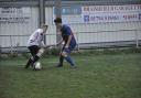 Action from Saturday's match between Romsey Town and New Milton