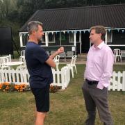 Steve Brine at Hursley Park Cricket Club talking to club chairman David Worthy