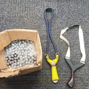 Two catapults and ball bearings were seized by police.