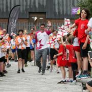 Baton bearer Jordan Wylie arriving at Winchester Sport and Leisure Park in Barend