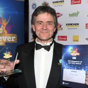 Michael Bailey with his award