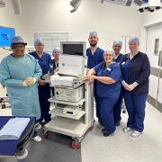 Bhaskar Somani using the smart glasses with his team at Nuffield Health Wessex Hospital