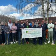 South Winchester Golf Club presenting the cheque to Hampshire and Isle of Wight Air Ambulance