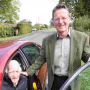 Just one of the good turns carried out in 2011 by the Winchester Good Neighbours group with its leader, Lou Lewis, giving a lift to John Sibbald from Oliver’s Battery to a Remembrance Service in November