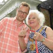 Hugh Fearnley-Whittingstall accepts the keys to Abbey Mill from the Mayor of Winchester, Cllr Eileen Berry.