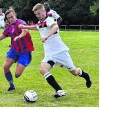 : A young Romsey Town side in action during their heavy home defeat against US Portsmouth