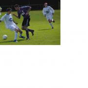 ON THE ATTACK: Dan Hansford in action for Whitenap against FC Central.