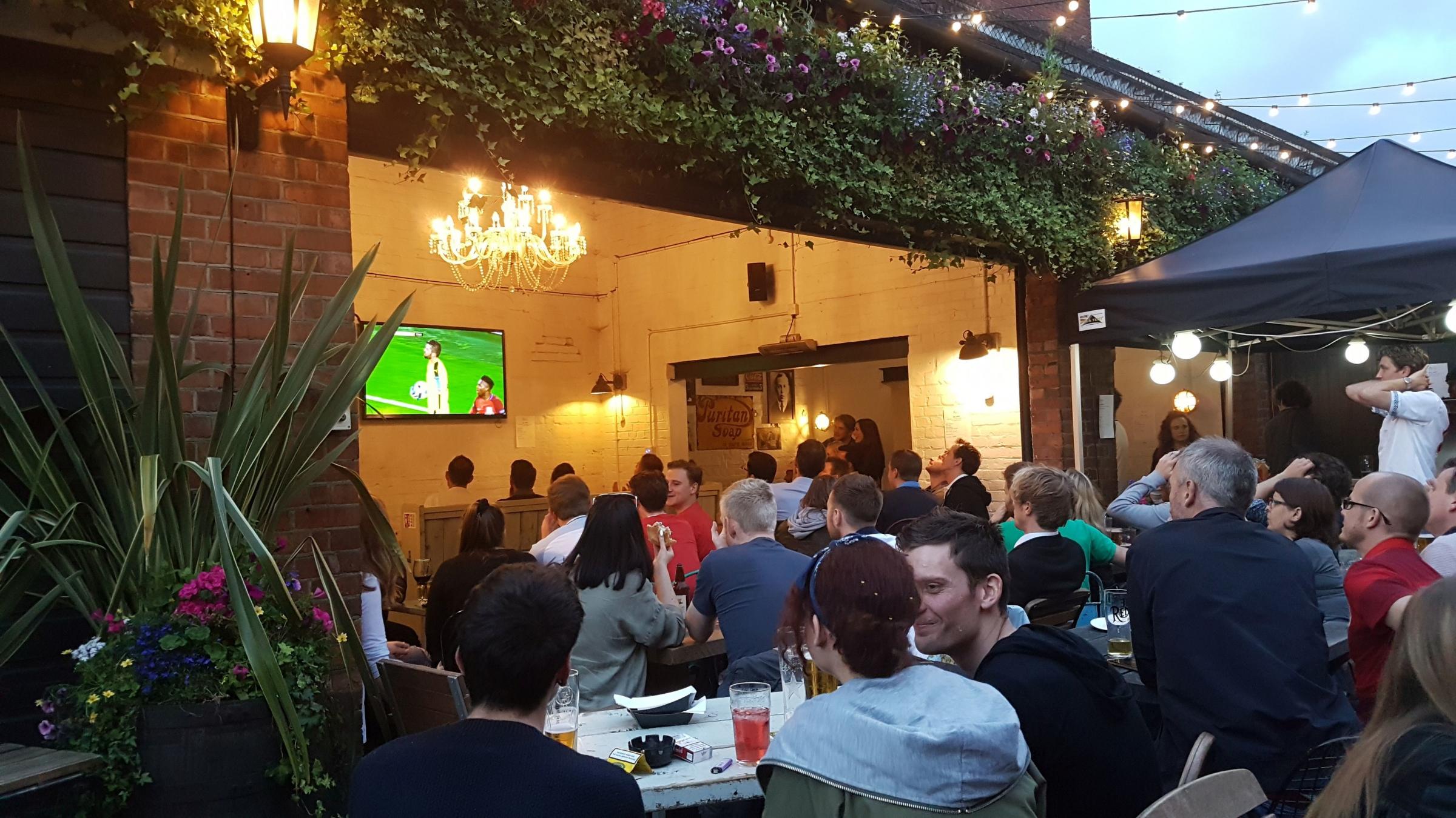 England fans at Alfies in Winchester watching the 0-0 draw against Slovakia.