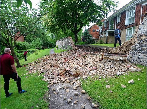 Council workers at the collapsed wall on Tuesday. Photo: Tom Czarnota