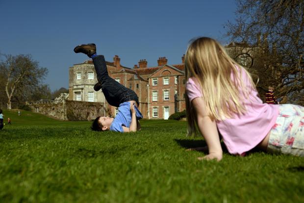 Hampshire Chronicle: Children playing in the springtime at Mottisfont, Hampshire.