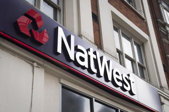 File photo dated 18/11/16 of a branch of NatWest in Bishopsgate, London. NatWest smashed expectations in the first half of the year as it withdrew cash that had been set aside for a rainy day and hiked shareholder payouts. The bank said that operating