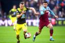 Southampton's James Ward-Prowse (left) and West Ham United's Aaron Cresswell battle for the ball during the Premier League match at London Stadium..