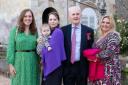 Mr Cookson with his three daughters and grandchild