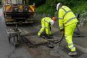 Pothole being repaired