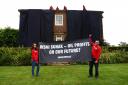 Greenpeace activists blanketed the home in black fabric in protest over Rishi Sunak’s North Sea oil announcement earlier this week