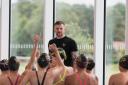 Adam Peaty teaching young swimmers at the Winchester AP Race Clinic