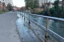 River Itchen overflows along The Weirs in Winchester