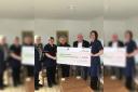 Itchen Valley Choir presenting the cheque to Winchester Hospice