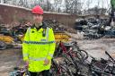 Inspector Andy Tester  and the crushed bikes and scooters