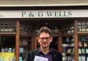 Steve Scholey of P&G Wells holding the shop's bestsellers
