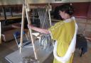 Dr Carey Fleiner at work on her loom