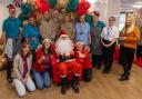 Seventeen photos show Father Christmas making special appearance at hospice