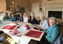 Broderers at work in their Cathedral Close stitching room