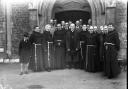 Roman Catholic friars outside St Peter's church in Jewry Street