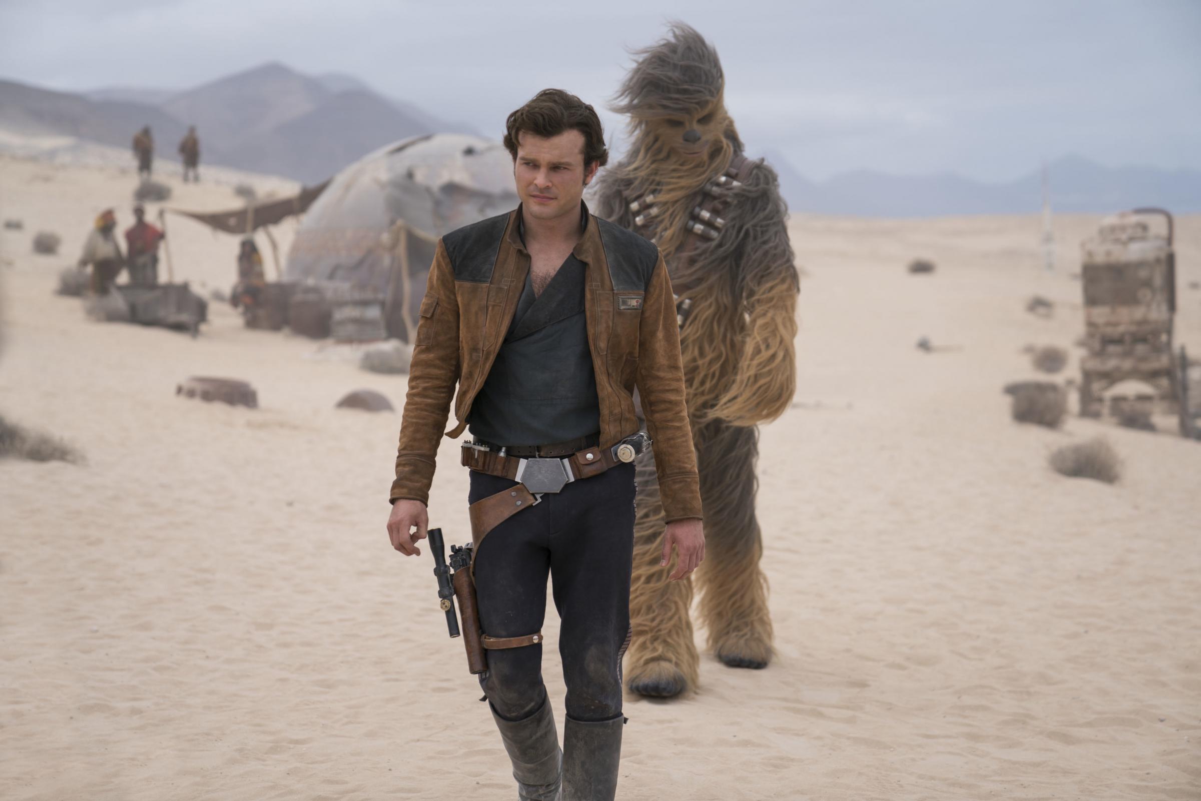 Undated film still handout from Solo: A Star Wars Story. Pictured: Alden Ehrenreich as Han Solo and Joonas Suotamo is Chewbacca. See PA Feature SHOWBIZ Download Reviews. Picture credit should read: PA Photo/Lucasfilm Ltd/Jonathan Olley. WARNING: This