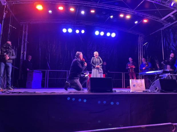 Hampshire Chronicle: Toby Anstis and Lily on stage before switching the Christmas lights on