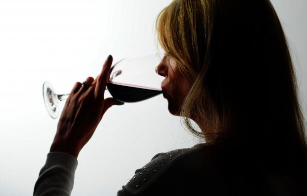 Hampshire Chronicle: A woman drinking red wine. Credit: PA
