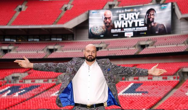 Hampshire Chronicle: Tyson Fury poses on the pitch after the press conference at Wembley Stadium, London (PA)