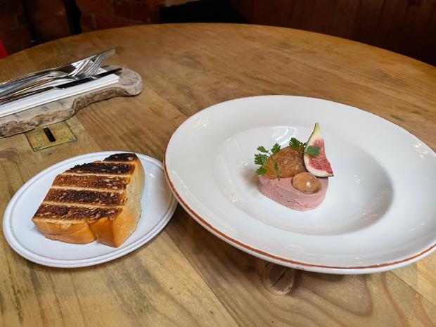 Hampshire Chronicle: Chicken liver parfaity, fig & onion chutney, brandy jelly and a toasted brioche slice. Credit: Luke Emmess, Head Chef at Wykeham Arms