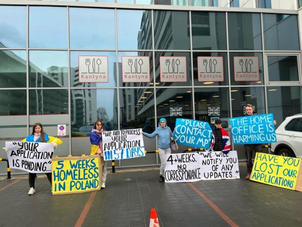 Hampshire Chronicle: Refugees protesting outside the hotline and the visa centre in Rzeszow, Poland
