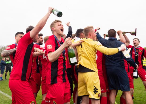 Hampshire Chronicle: Post-match celebrations for Winchester City, photo: Gary Marsh