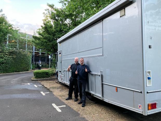 Hampshire Chronicle: Film crews have taken over Barfield Park and Ride site in Winchester. Pictured Antonio Zuri and Sam Thomas from Antonio's Film Catering. 
